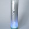 Lamp shown with flood lit backdrop displaying face view.