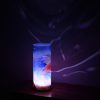 Shown on a display shelf displaying projected color images on backdrop using its internal LED.