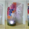 Alternate flood lit views of lamp are arranged in a triptych.