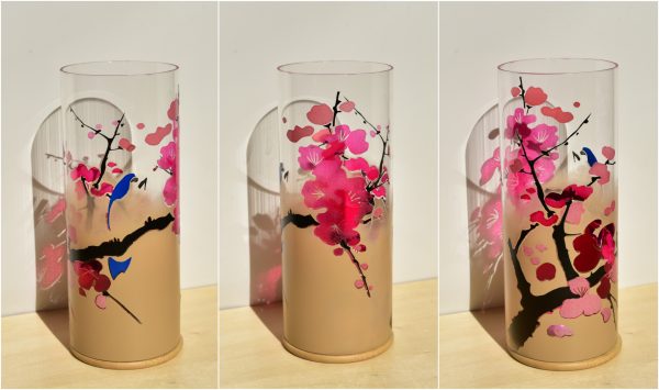 Under flood light, three alternate views are arranged in a triptych.