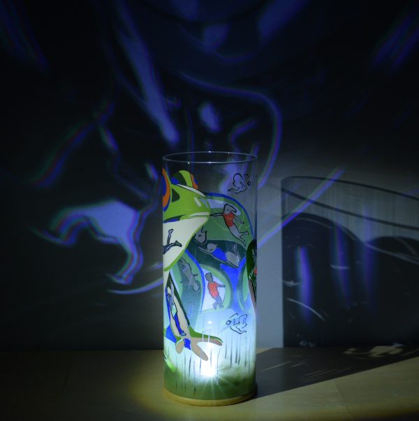 Lamp shown displaying brilliant projected images under spot light along with its internal LED. This highlights the lamp’s multidimensional aspect;