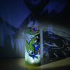 Lamp shown displaying brilliant projected images under spot light along with its internal LED. This highlights the lamp’s multidimensional aspect;
