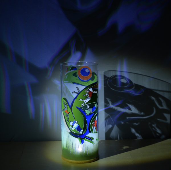 Lamp shown displaying brilliant projected images under spot light along with its internal LED. This highlights the lamp’s multidimensional aspect;