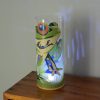 Shown on a display shelf displaying brilliant projected images using only its internal LED.