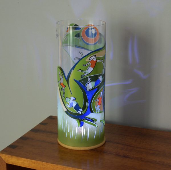 Shown on a display shelf displaying brilliant projected images using only its internal LED. Showing rear view.