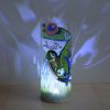 Lamp shown displaying brilliant projected images using only its internal LED.