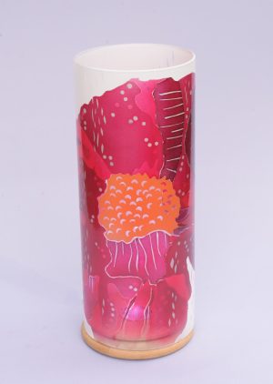 Unique art glass Lamp shown lit by overcast full sun, front view.
