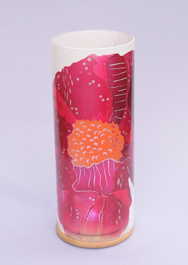 Unique art glass Lamp shown lit by overcast full sun, front view.