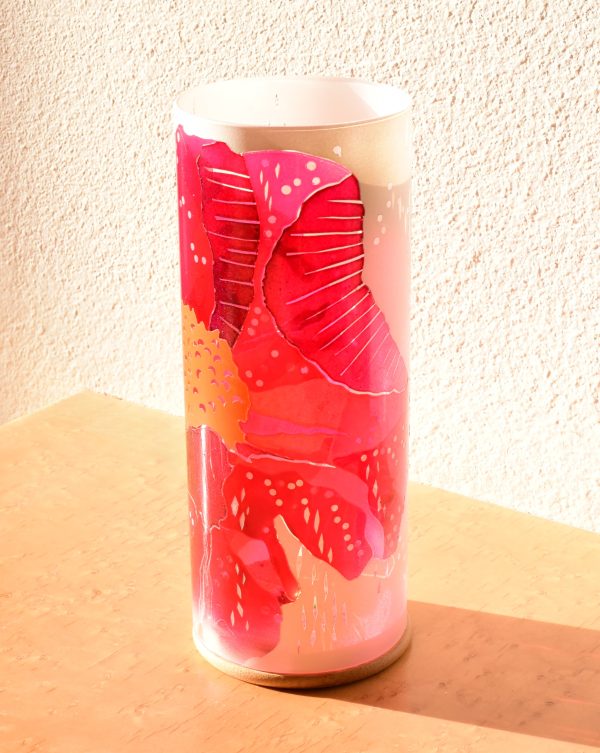Lamp shown on display counter at sun rise bathed in full sun.