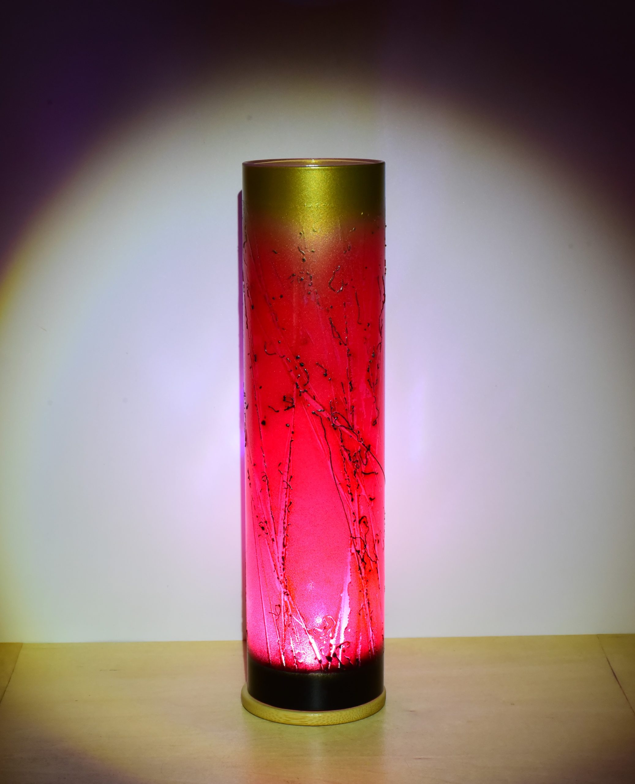 Shown under flood light displaying complex texture of raku technique.