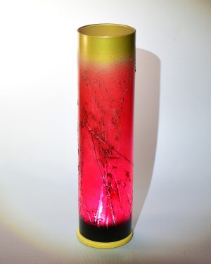 Scorched horse tail hair applied over red glaze.