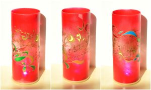 Bow String Trip Accent lamp shown in full sun in three stages of rotation arranged in a triptych.